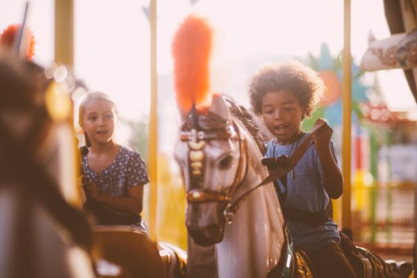 Little boy on a carousel