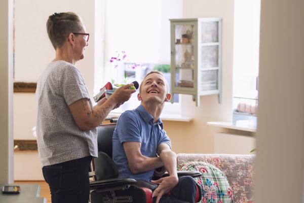 Respite carer spending time with a teenager