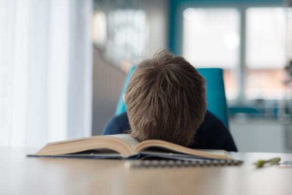 Tired Boy Doing His School Work