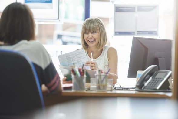 Foster Carer engagement officer talks to a prospective foster carer