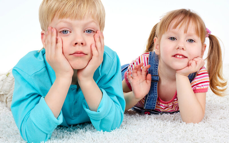 Siblings getting photo taken