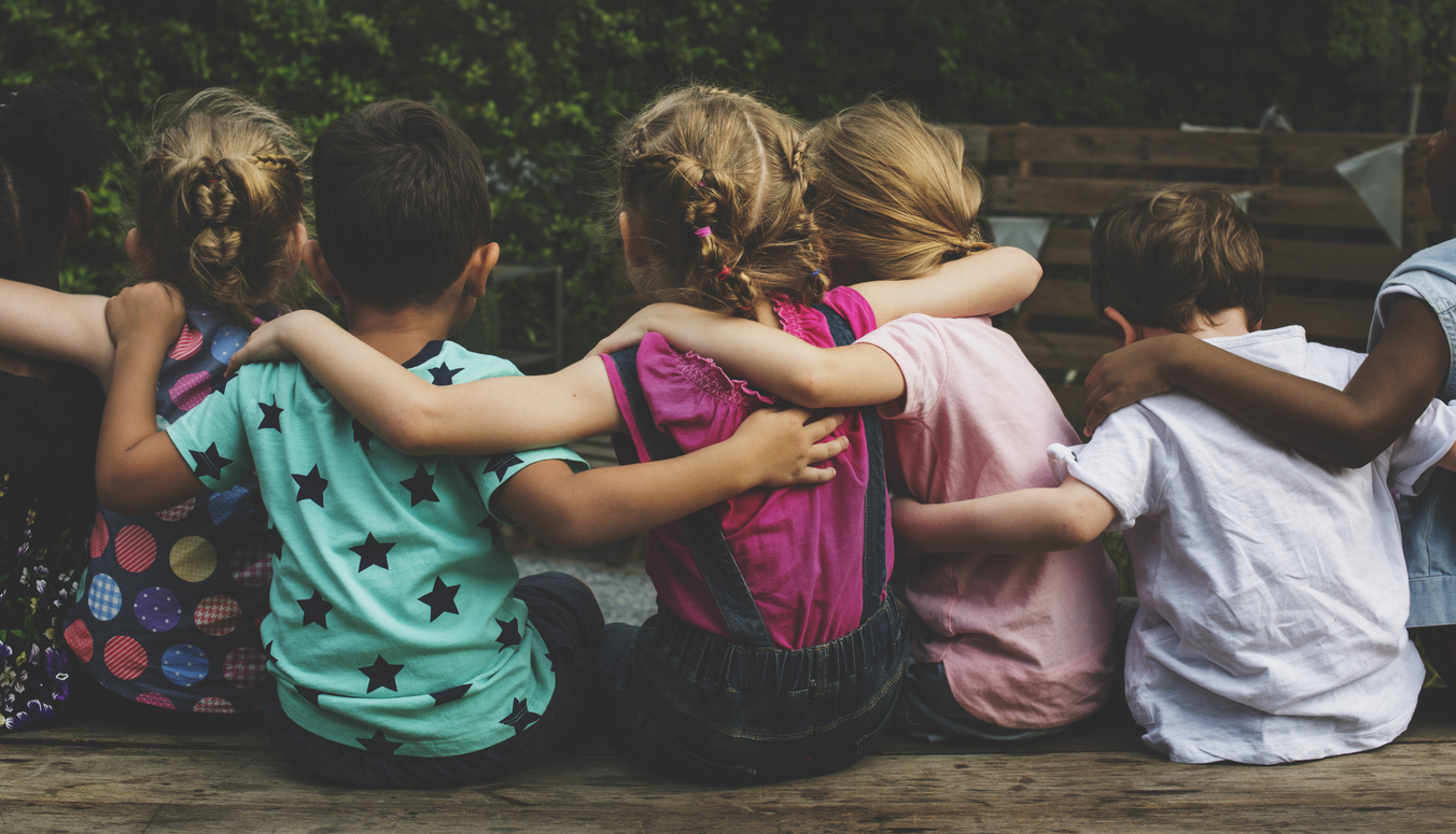 Group of small children in the garden with National Fostering Group