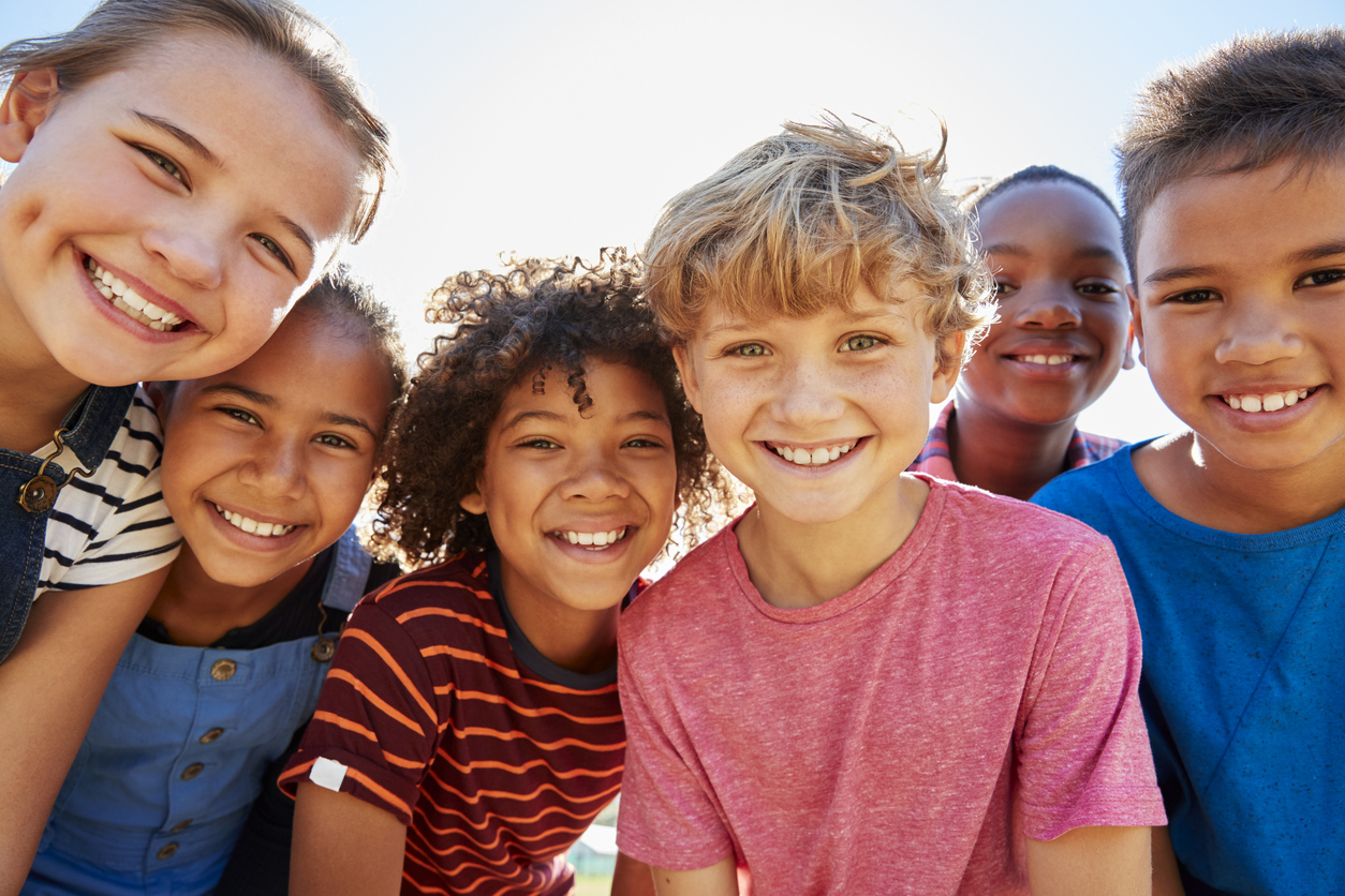 Children smiling for photo