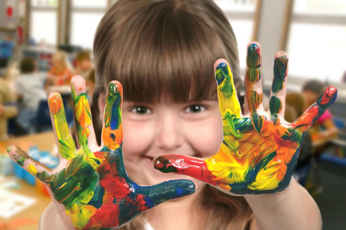 Girl with paint on hand