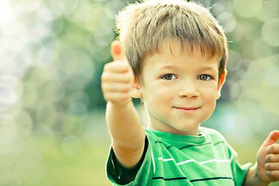 Boy with thumbs up