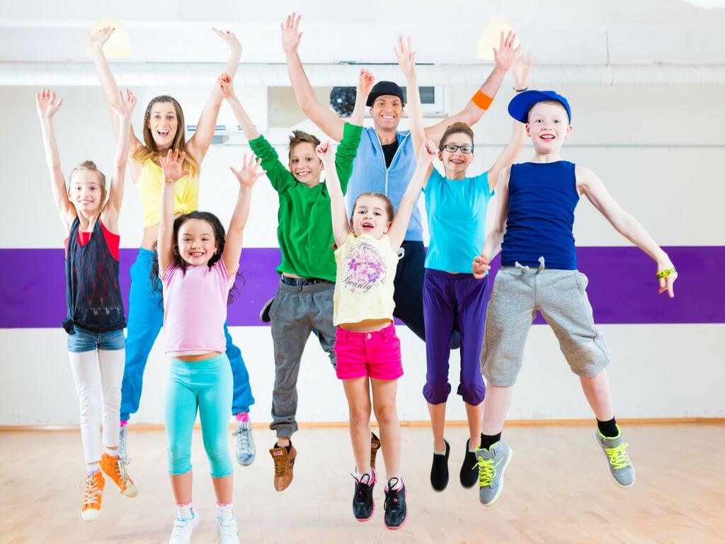 group of children jumping in air