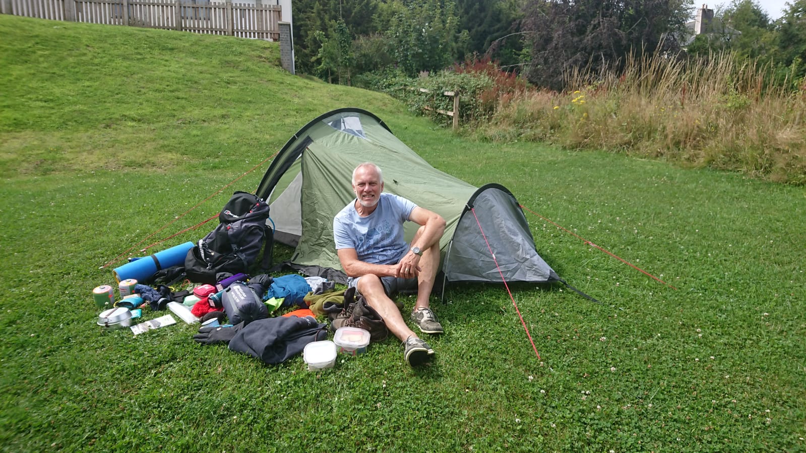 Edward with tent and supplies