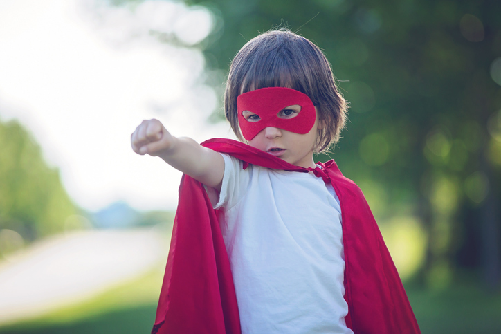 Foster child playing at being a superhero