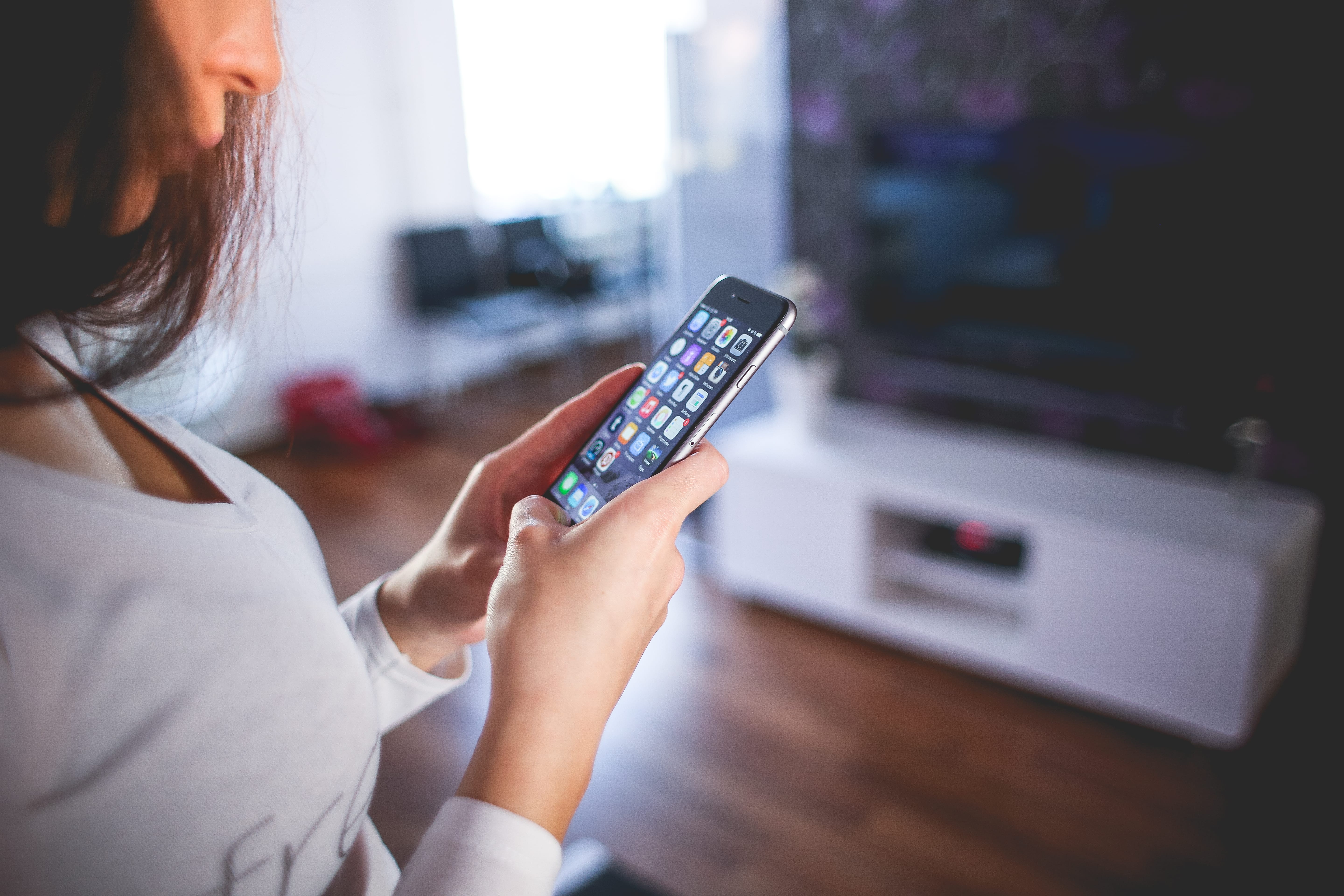 Woman looking at iphone