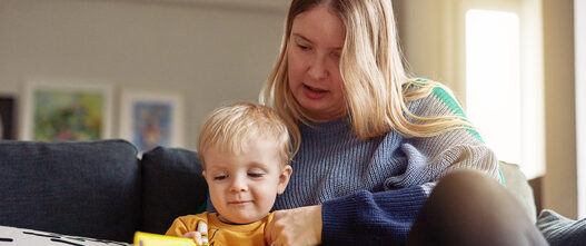 woman reading with boy